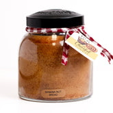 A Cheerful Giver banana nut bread candle jar with lid boosts cozy ambiance.