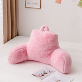 A Nice Night faux fur reading pillow backrest on bed provides plush support