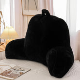 A Nice Night faux fur reading pillow in black, front view for upright reading.