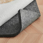 Acapet rug pad quarter-inch felt top offers soft cushioning and grip.