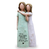 AcowSpt mom-daughter figurine in an embrace highlighting love.
