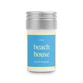 Aera Beach House ocean air bottle releases a fresh coastal scent.