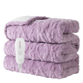 Aheadpret heated blanket on bed providing full-body warmth with plush jacquard fabric.