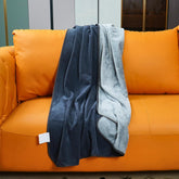 Ahinahwap waterproof blanket on bed protecting against spills and stains.