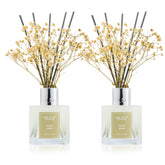Airkeep Clean Linen reed diffuser bottles brightening a living room ambiance