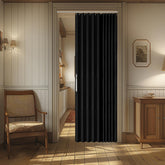 AJAZZ blackout magnetic door curtain blocks light in doorway for privacy.