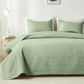Akkialla king size quilt in sage green with coin-pattern stitching for durability