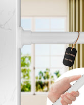 Allzone tension rod extended to 83β123 inches for secure window coverage.
