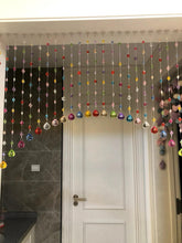 Alpengulen crystal beaded curtain with multicolor rainbow beads drapes gracefully as a doorway accent