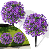 Alupssuc topiary ball with purple blooms for outdoor curb appeal.