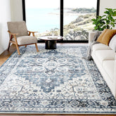 AMADA HOMEFURNISHING 6x9 blue rug with soft pile for cozy living spaces.