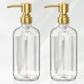 AmazerBath glass dispenser with clear bottle and gold pump for easy soap dosing
