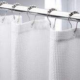 AmazerBath waffle-texture shower curtain in white with close-up detail for upscale look.