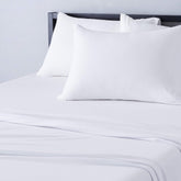 Amazon Basics breathable jersey twin sheet on bed showing soft fabric and comfort