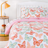 Amazon Basics butterfly skies comforter close-up showcasing soft microfiber texture for all-season warmth.