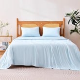 Amazon Basics cooling sheets on a king bed showing breathable fabric