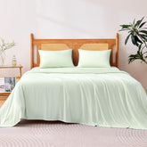 Amazon Basics cooling sheets on a queen bed show a breathable, cool sleep surface