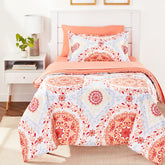 Amazon Basics coral medallion comforter set on twin bed showing cohesive design and color