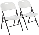 Amazon Basics folding chair with white seat and back support for versatile indoor seating.