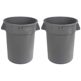 Amazon Basics heavy-duty round trash can 32-gallon grey in a commercial space.