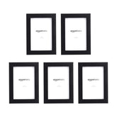 Amazon Basics 6x4 frame shown on wall with hanging option for versatile display.