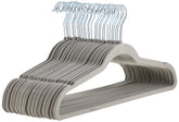 Amazon Basics slim velvet hangers boxed in grey for organized closet storage.