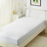 Amazon Basics zippered waterproof mattress encasement protecting a full mattress against spills and bed bugs