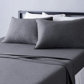 Amazon Basics king dark gray jersey close-up shows soft knit and stretch