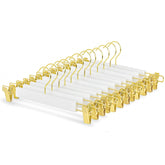 Amber Home solid white wood pant hanger with gold hook for closet organization.