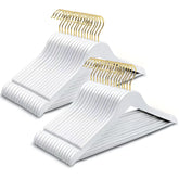 Amber Home white wood hangers with gold hook for sleek closet organization.