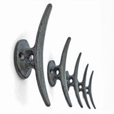 Ambipolar decorative cast iron double hook wall mount antique black supports coats, bags, and accessories.