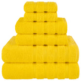 American Soft Linen bath towels in yellow 27x54 offer plush absorbency for quick drying.