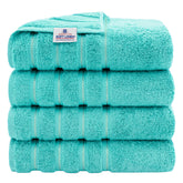 American Soft Linen luxury towels in turquoise four-piece set with plush, absorbent 600 GSM fabric.