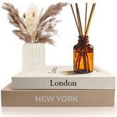 AMINALUX faux book storage boxes on a coffee table with hidden storage and elegant linen finish