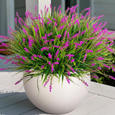 Ammyoo artificial monkey grass bundle adds evergreen greenery to outdoor spaces.