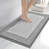 Anllugs bathroom rug with plush surface for soft, cozy feet.