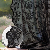 Anmao vintage black lace curtains, 84-inch two-panel set framing a softly lit window