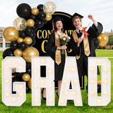 Aotiooy graduation decorations with 3ft GRAD marquee letters illuminate bold classroom displays.