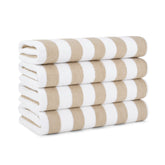 Arkwright California Cabana Stripe Beach Towel, 30x70 inches, laid out poolside for lounging.