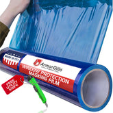ArmorDillo blue window protection film roll shields glass during painting or remodeling