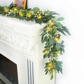 Artgar eucalyptus garland with lights close-up showing lifelike leaves and warm glow
