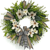 ARTINCRAFIO 24-inch Magnolia Wreath on front door enhances curb appeal.