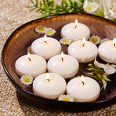 Ashlux white floating candle 2-inch for long-lasting centerpieces and ambient glow.