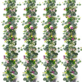 ASTNIC daisy garland with butterflies decorates wedding tables with vibrant color.