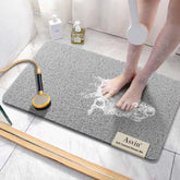 Asvin soft textured bath mat with non-slip surface for safer tub use.