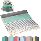 ATANI Turkish Beach Towel converts to a bag for hands-free carrying.