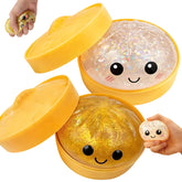 Aurasonic Glitter Dumpling Squishy Whiteβsoft texture for satisfying squeezes.