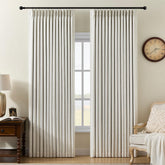 AUSSPVOCT pinched-pleated curtains with double-layer blackout darken a bedroom for restful mornings.