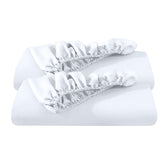 Bare Home two-pack Twin XL bottom sheets folded, smooth and ready for easy bed setup.