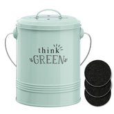 Barnyard Designs compost bin on the kitchen counter with mint lid for odor reduction.